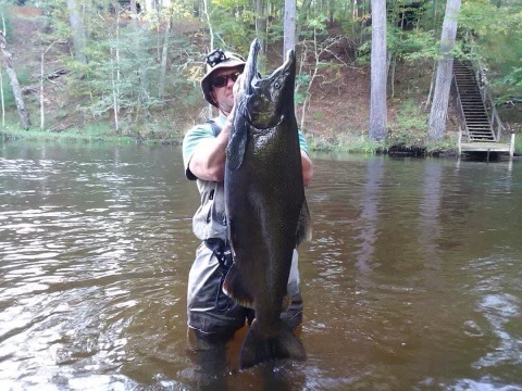 Fisherman showing off prized catch