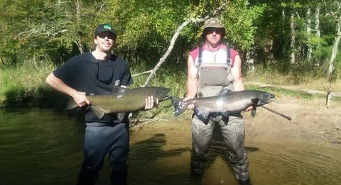 Two fisherman and their catch